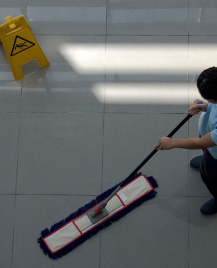 worker is cleaning the floor